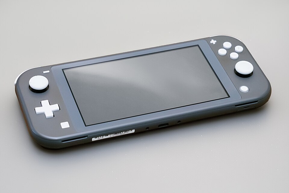 Consola portátil Nintendo Switch Lite de color gris.